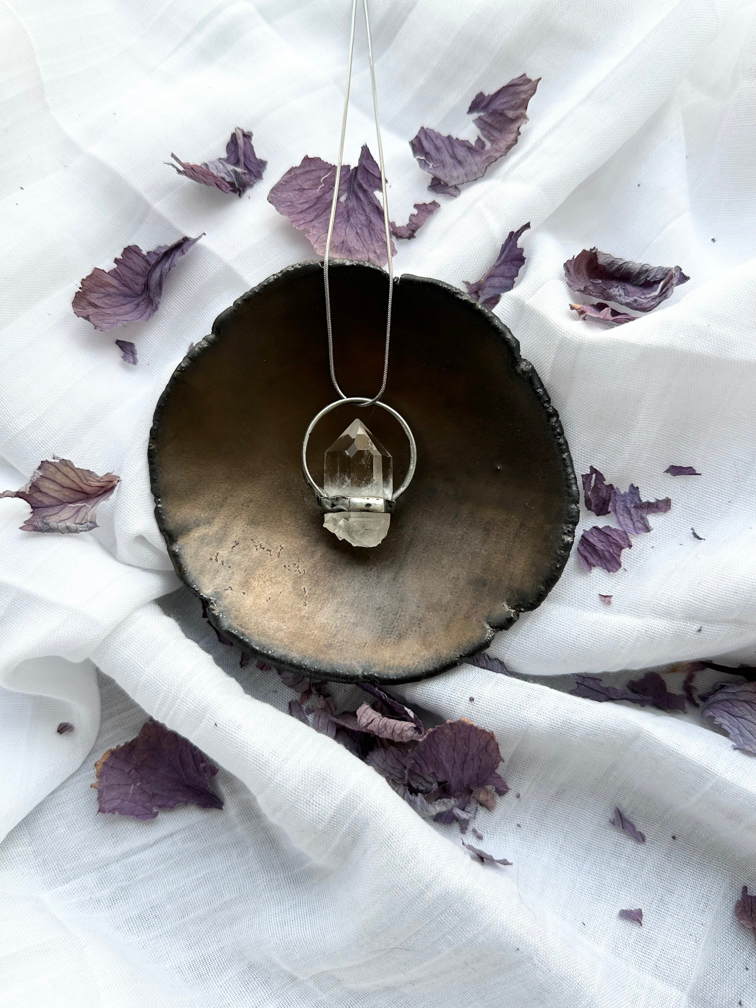 “The Watcher” – Clear Quartz Pendant by Laura Řezaninová