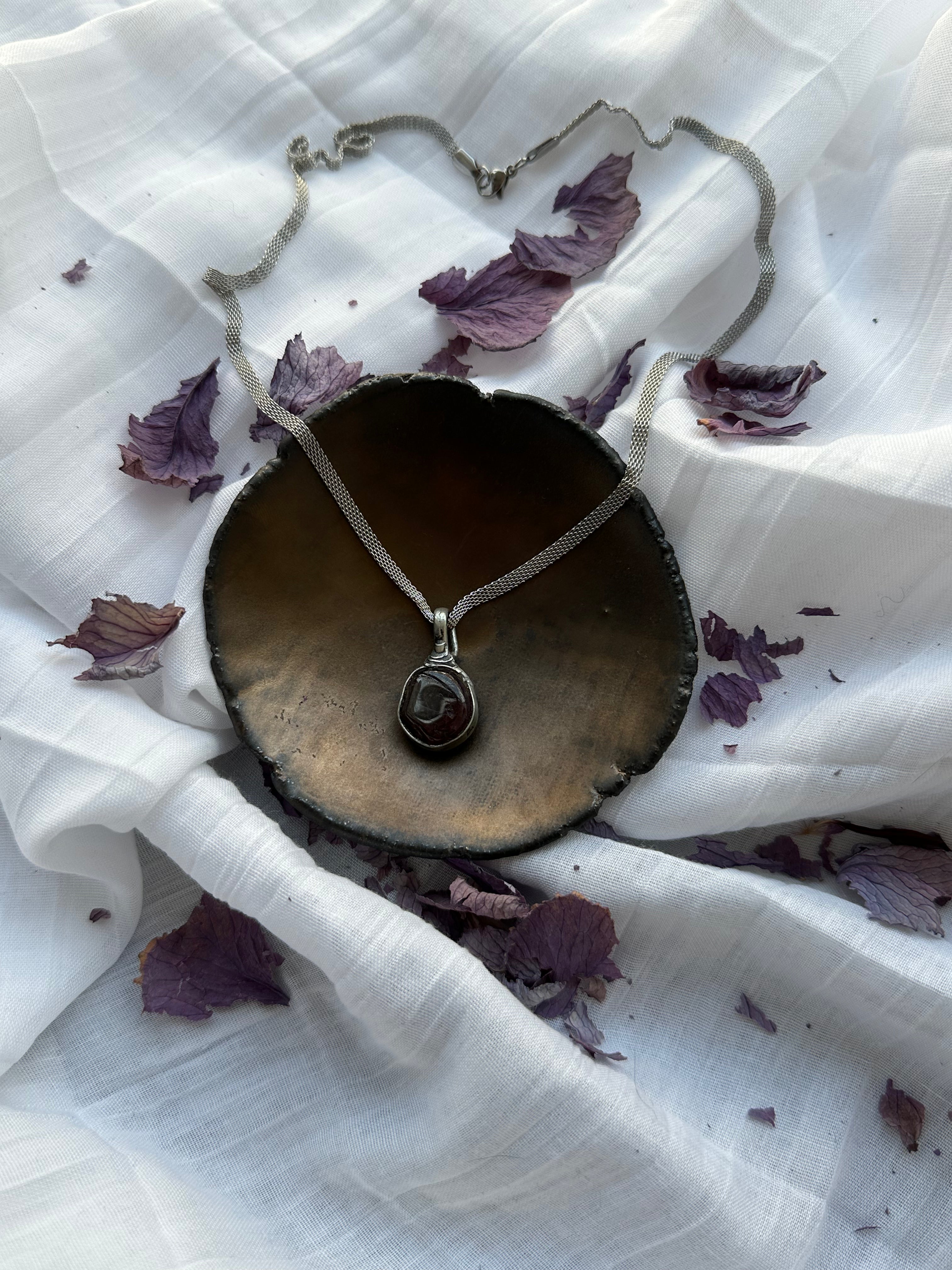 “Bloodroot” – Garnet Pendant by Laura Řezaninova
