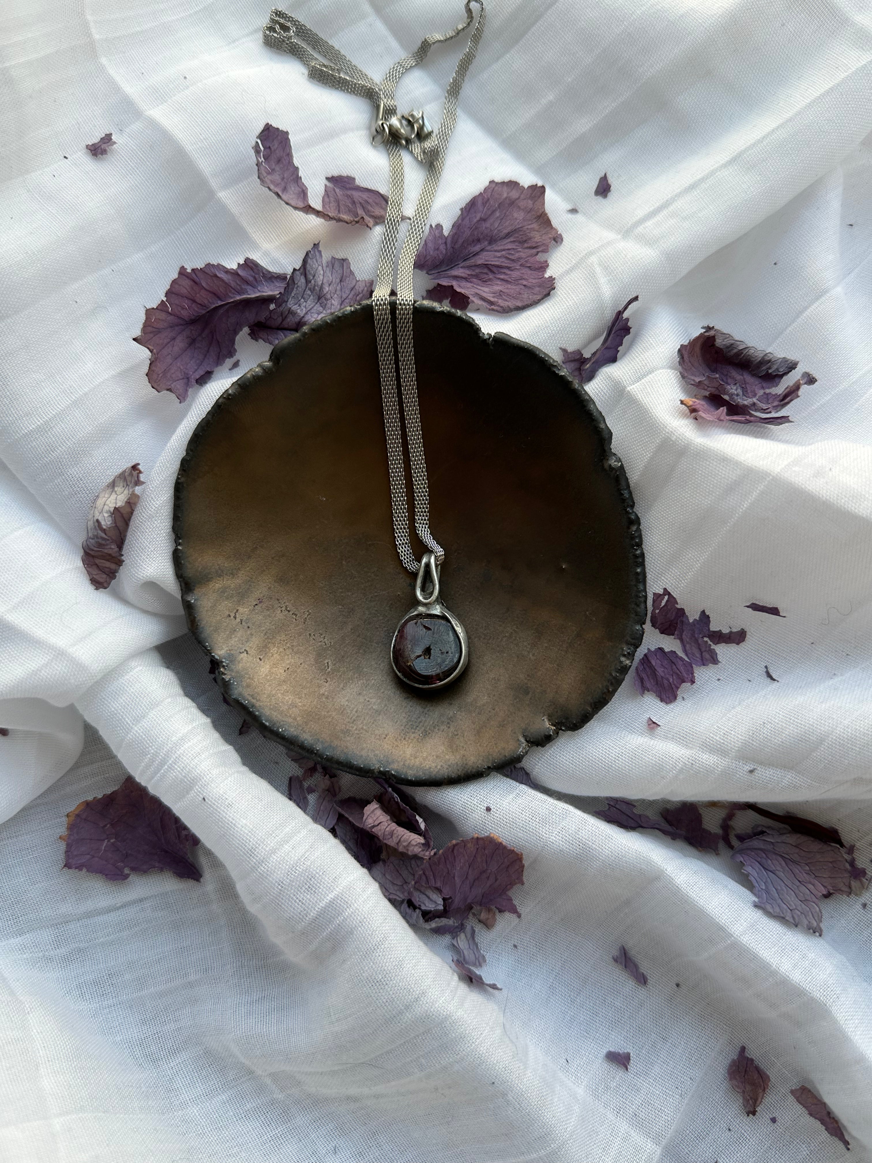 “Bloodroot” – Garnet Pendant by Laura Řezaninova