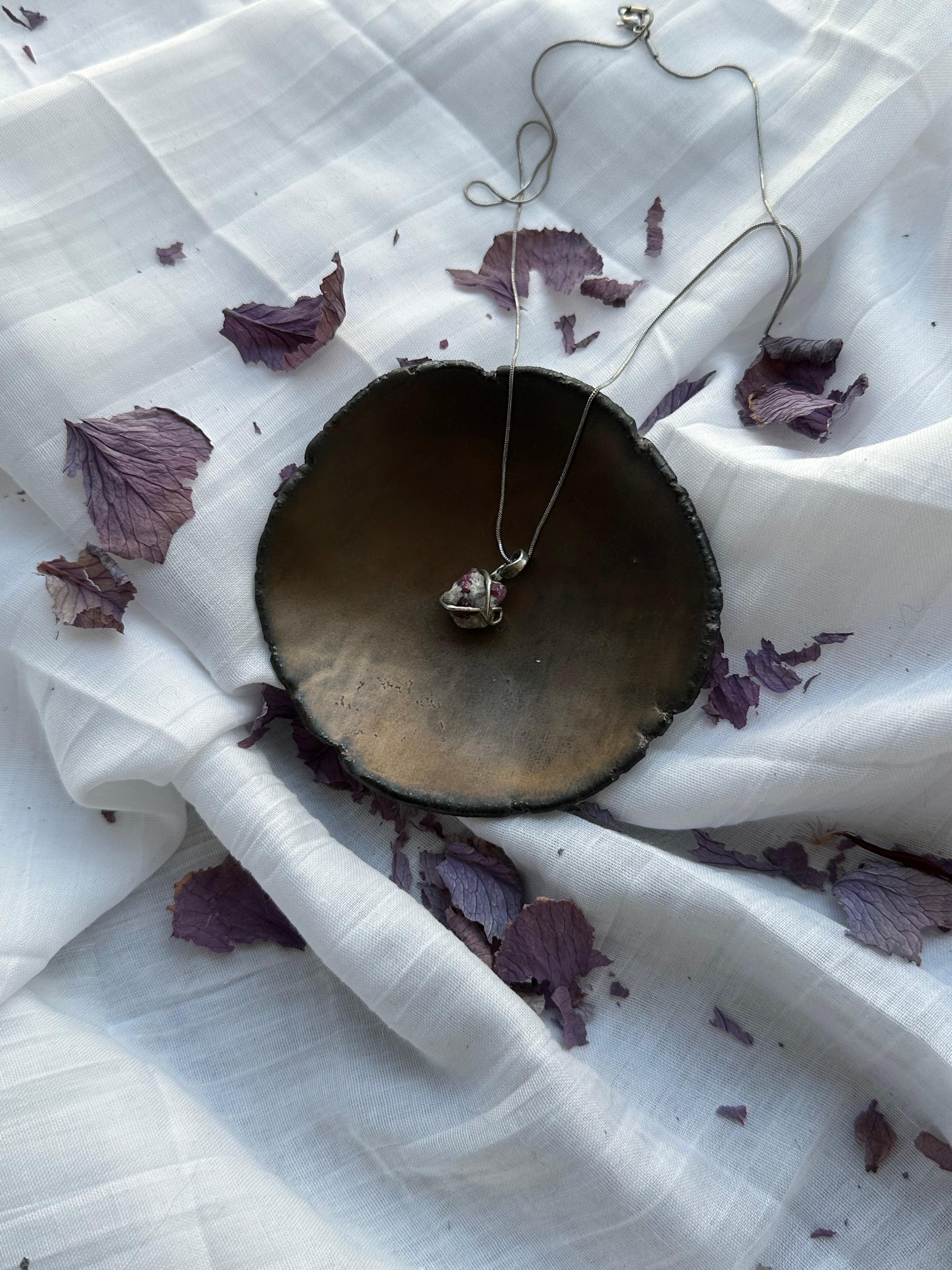“Core Flame” – Raw Ruby Pendant by Laura Řezaninová